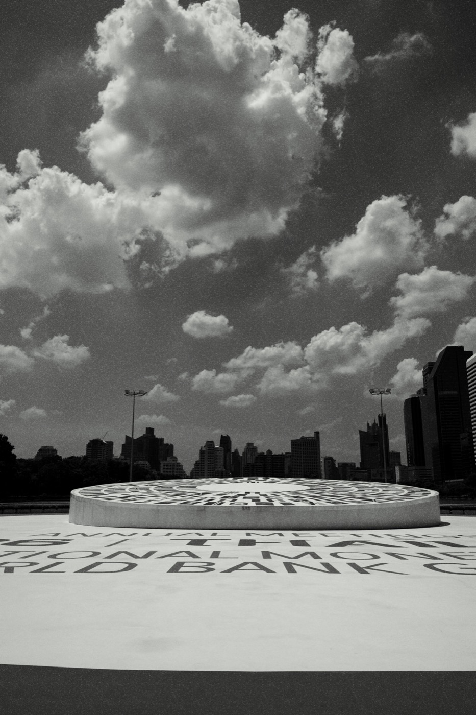 Plaza under dramatic clouds — Hi-Contrast B&W recipe